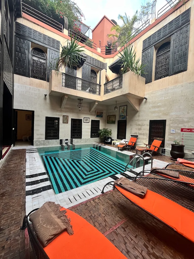 The heated pool courtyard at Riad Malika, in the Marrakech medina